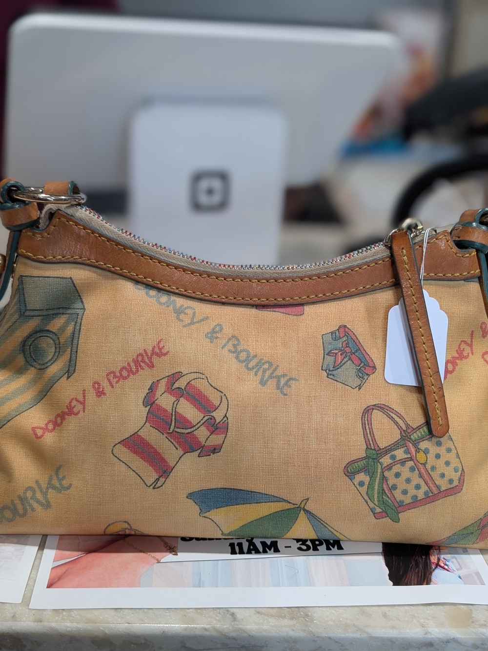 Dooney & Bourke Tan Printed Canvas Wristlet